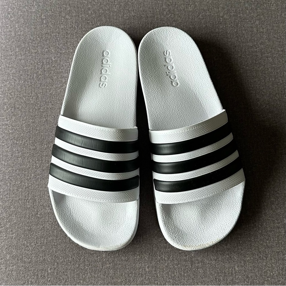 Adidas Men’s Comfy Slides US size 9.  White w/ Classic 3 Black Stripes (Italy)